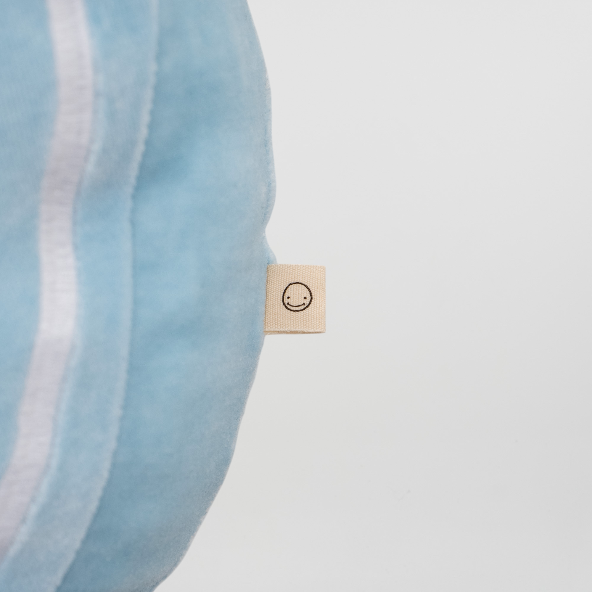 Smileyface Kissen hellblau